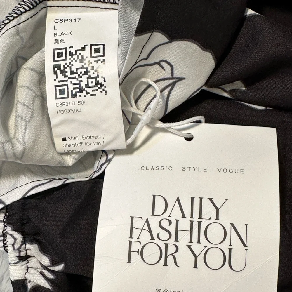 Elegant Black and White Floral Blouse - Picture 9 of 9